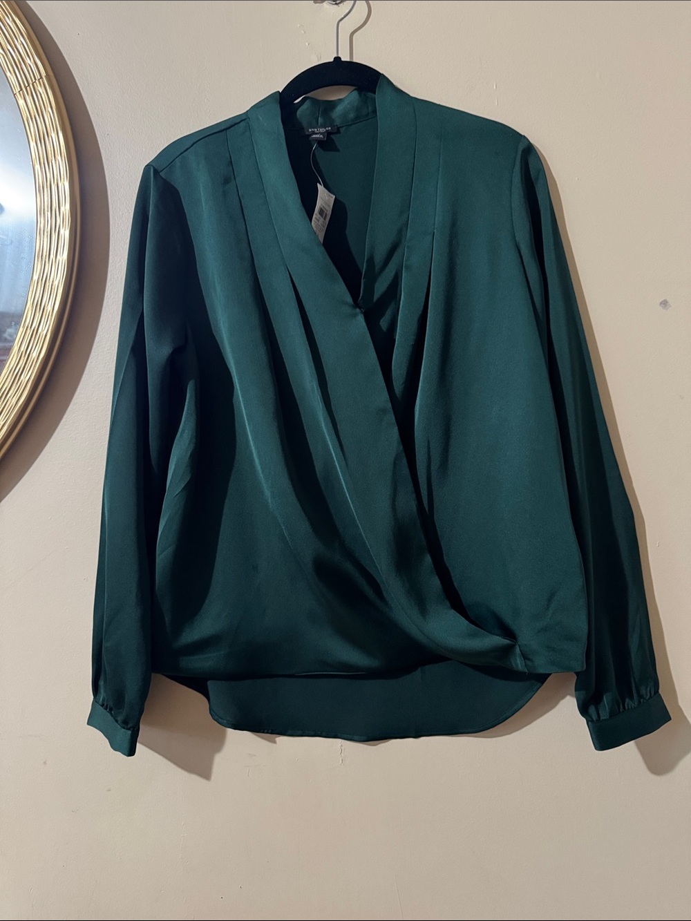 Ann Taylor Factory dark green blouse with elegant draped detail at the front
